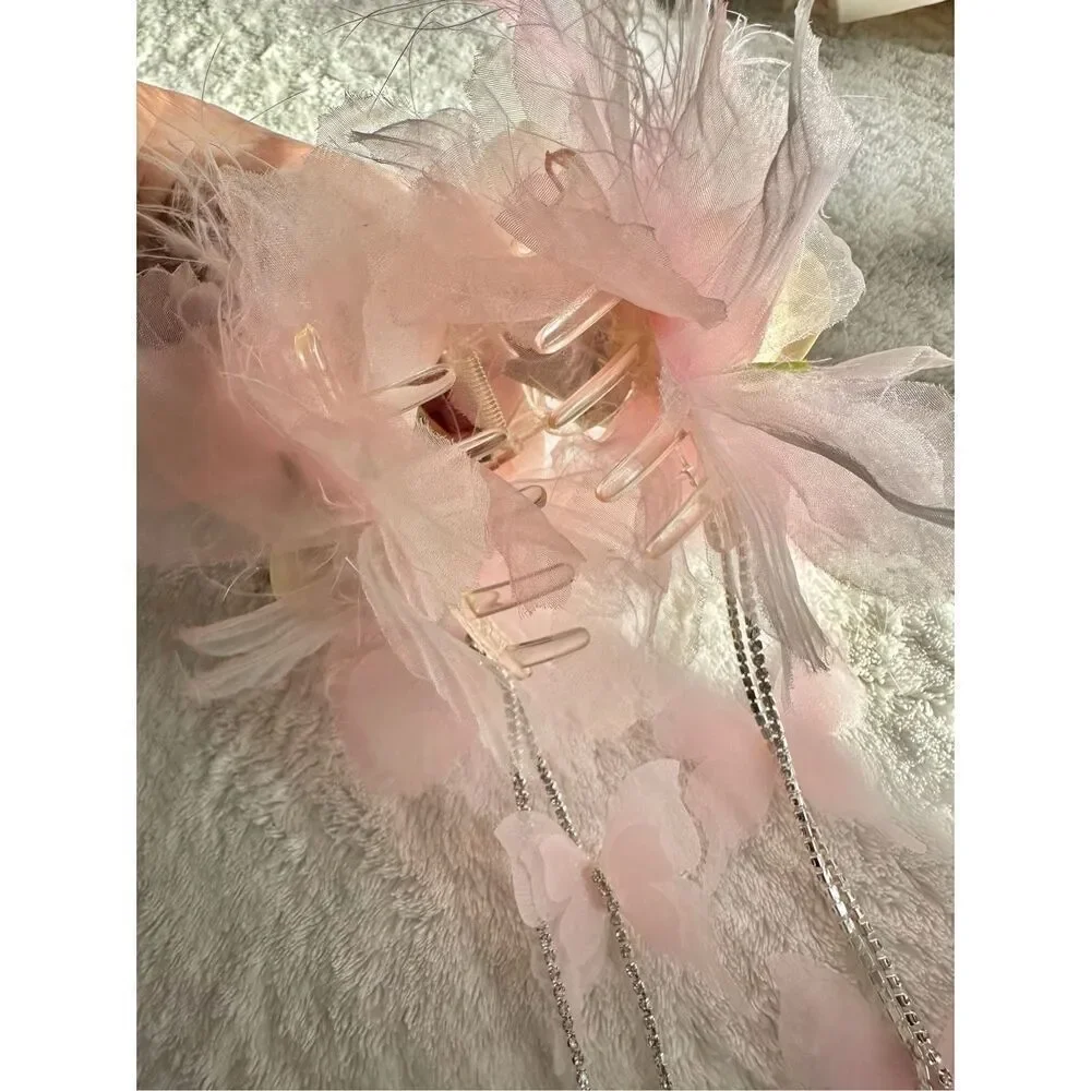 Light pink rose with feather hair claw